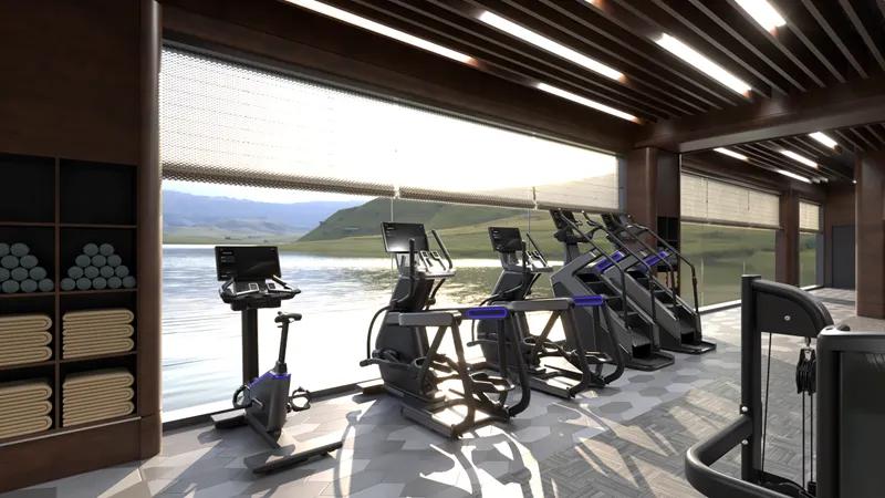 3D render of an high-end gym with cardio equipment facing windows looking over the water