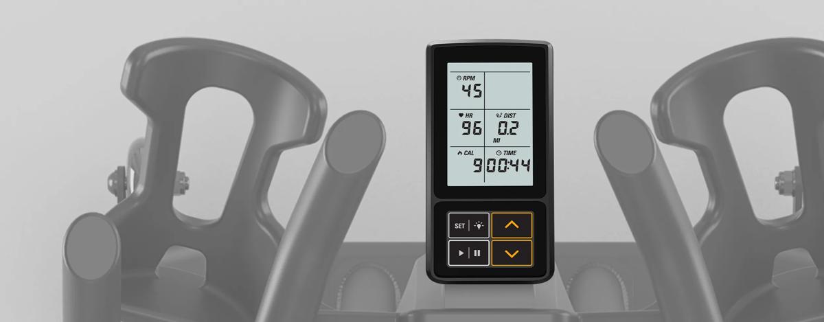 A close-up of the IC700 Indoor Cycle's digital display, showing workout metrics such as RPM, heart rate, distance, calories burned, and elapsed time. 