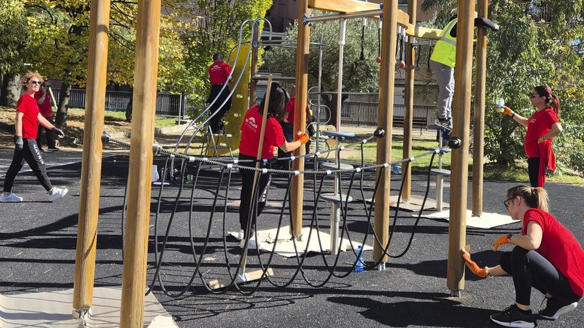 A group of people cleaning a playground.