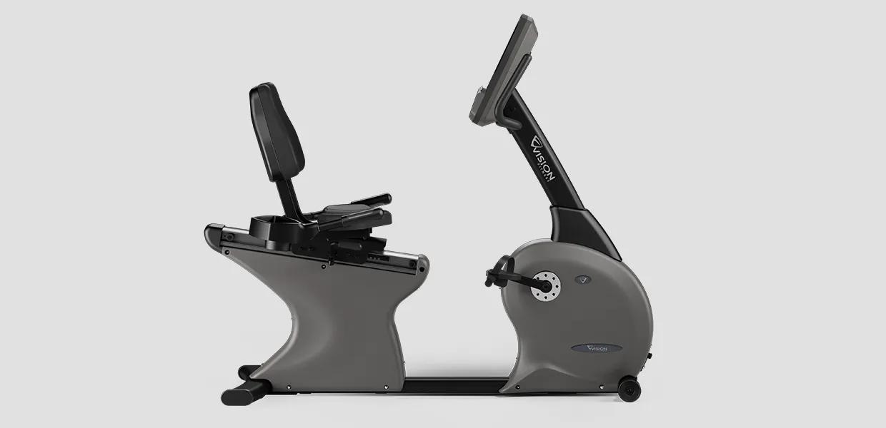 Side profile of the Vision Fitness Recumbent Bike, showcasing its seat and digital console.