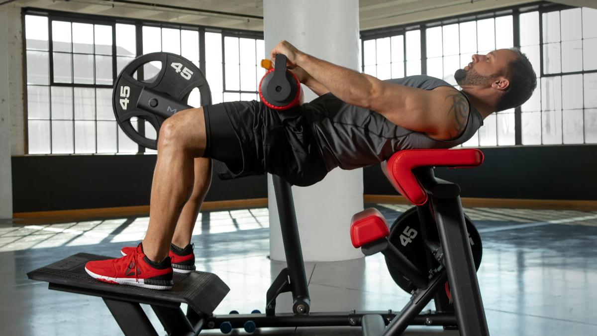 Man using Matrix Glute Trainer
