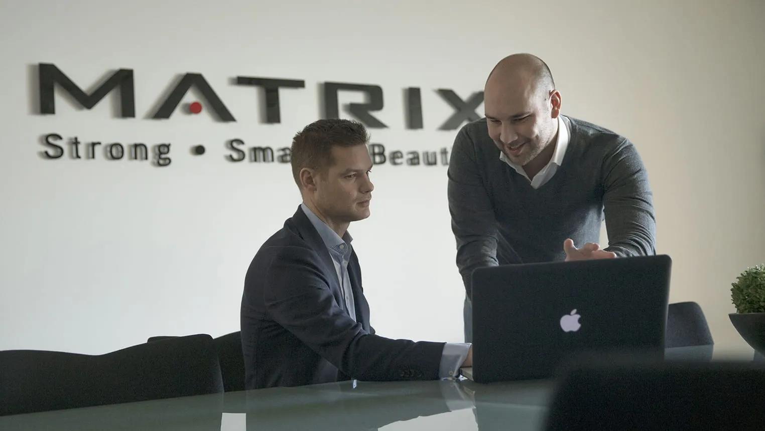 two males doing business