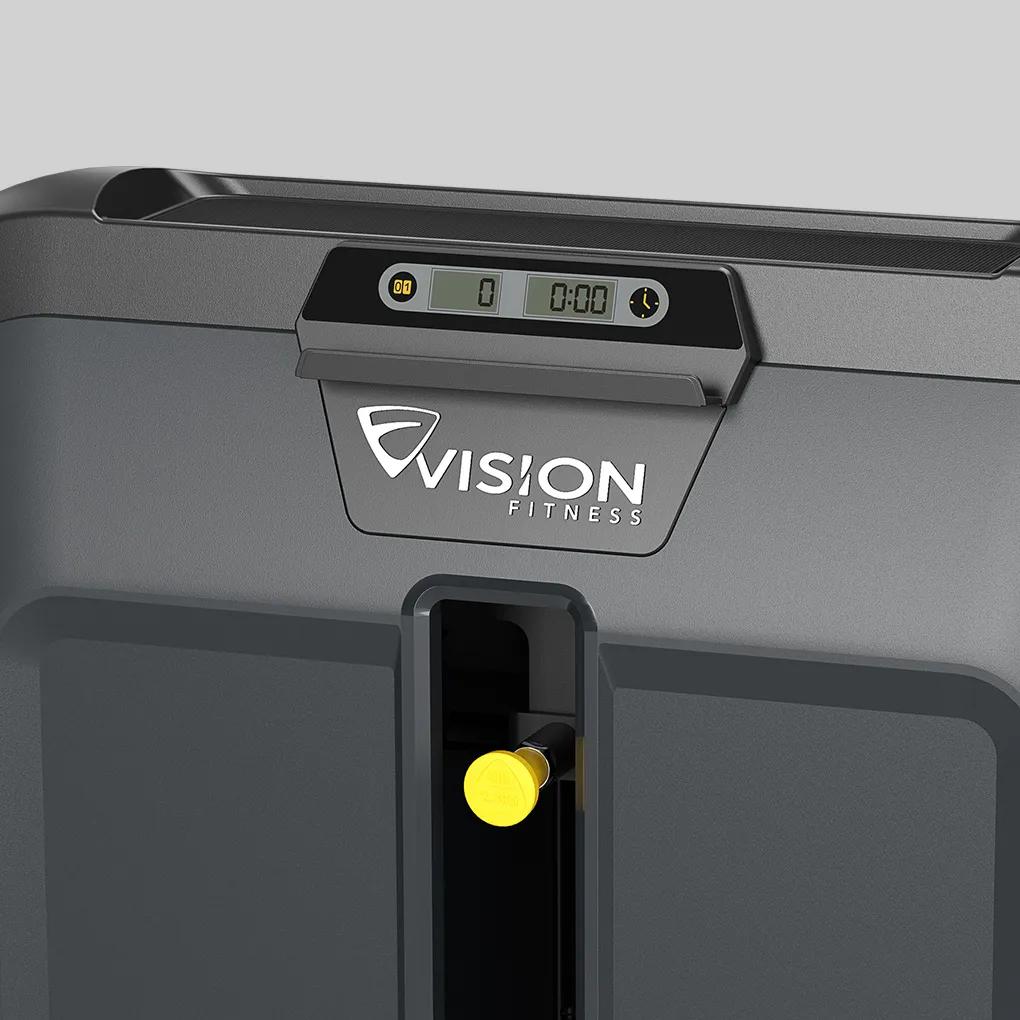 Close-up of the top section of a Vision Fitness strength machine in Matte Black, showing the logo, digital rep counter, and yellow weight selector pin.