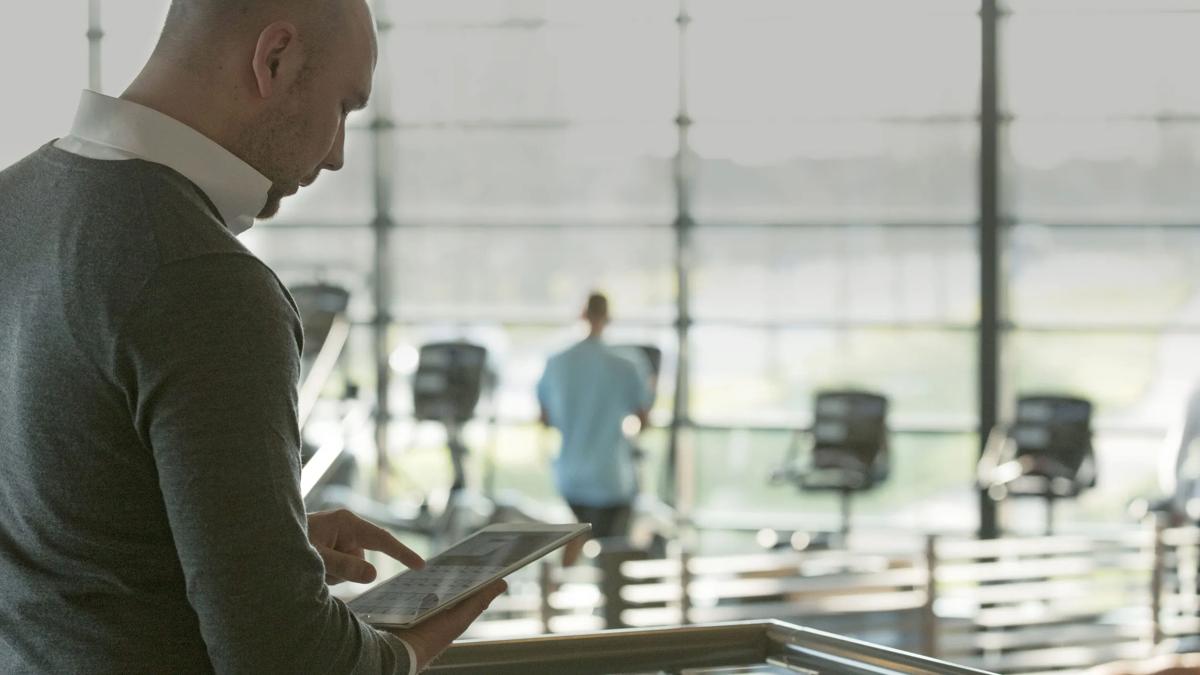 Gym owner looking around his gym