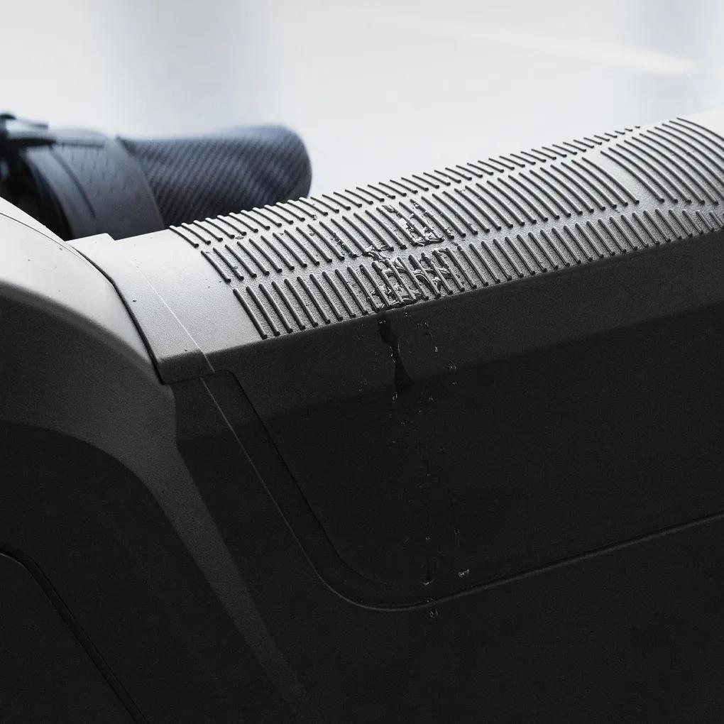 Close-up view of the Summit Upright Bike with sweat on its case, protecting its resistance system.