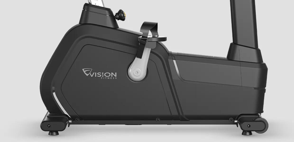 Close-up view of the bottom half of the Summit Upright Bike viewed from the side.