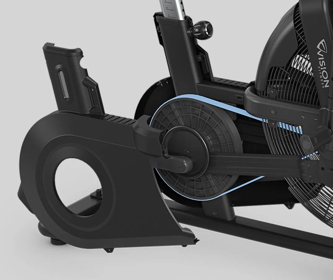 A close-up view of the AB700 Air Bike's belt drive system, featuring a large fan wheel and a protective casing partially removed to reveal the internal mechanism.