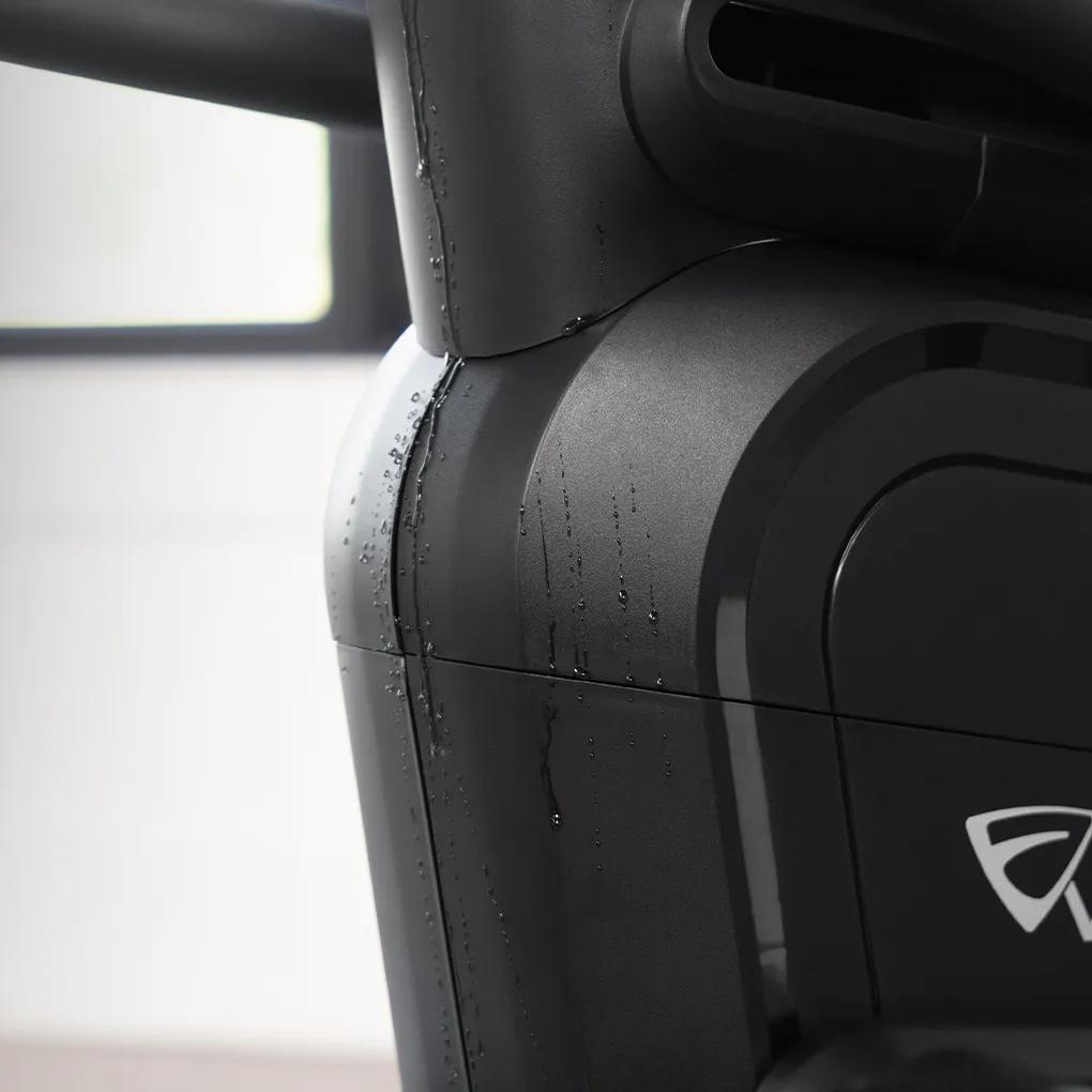 Close-up view of the Summit Ascent Trainer with sweat on its case, protecting its resistance system.