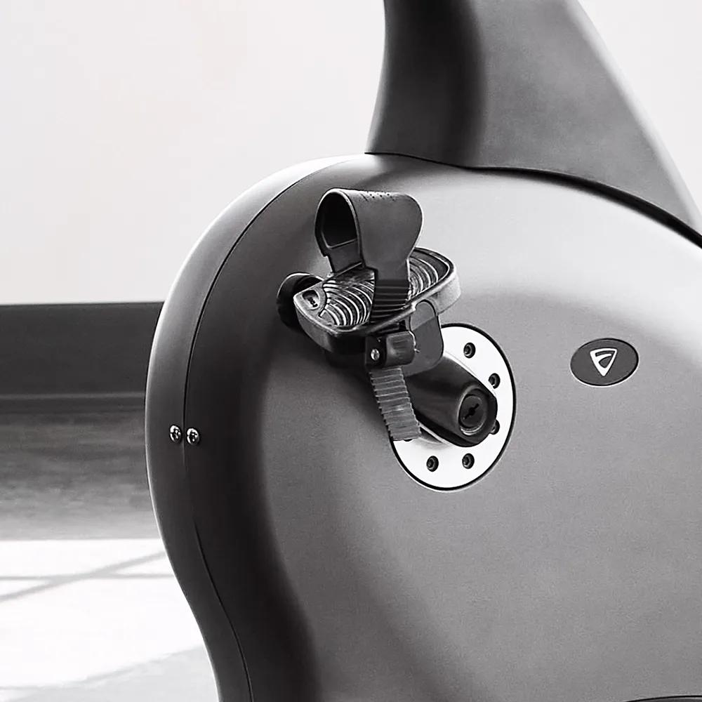 Close-up of the pedal on the Recumbent Bike, featuring an adjustable strap for a secure fit.