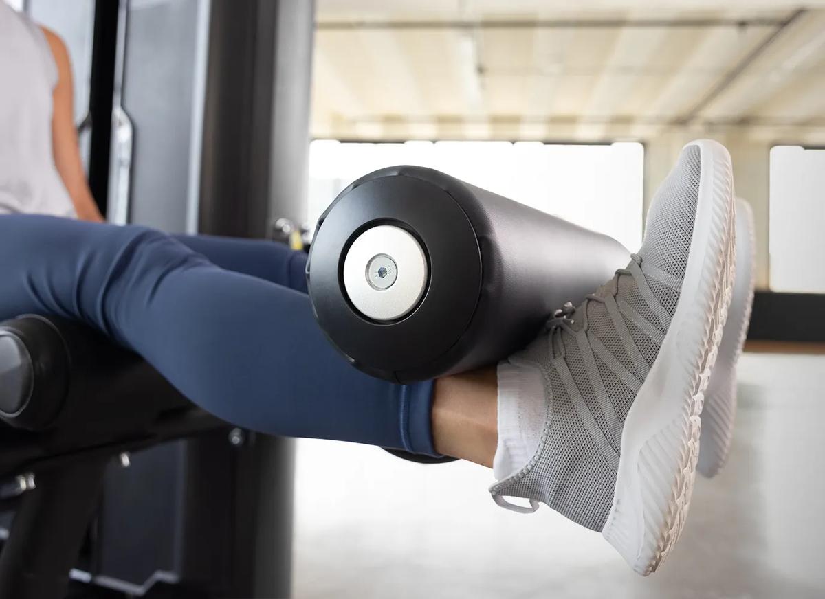 Close-up of the Keystone Leg Extension featuring its padded ankle roller and support frame.