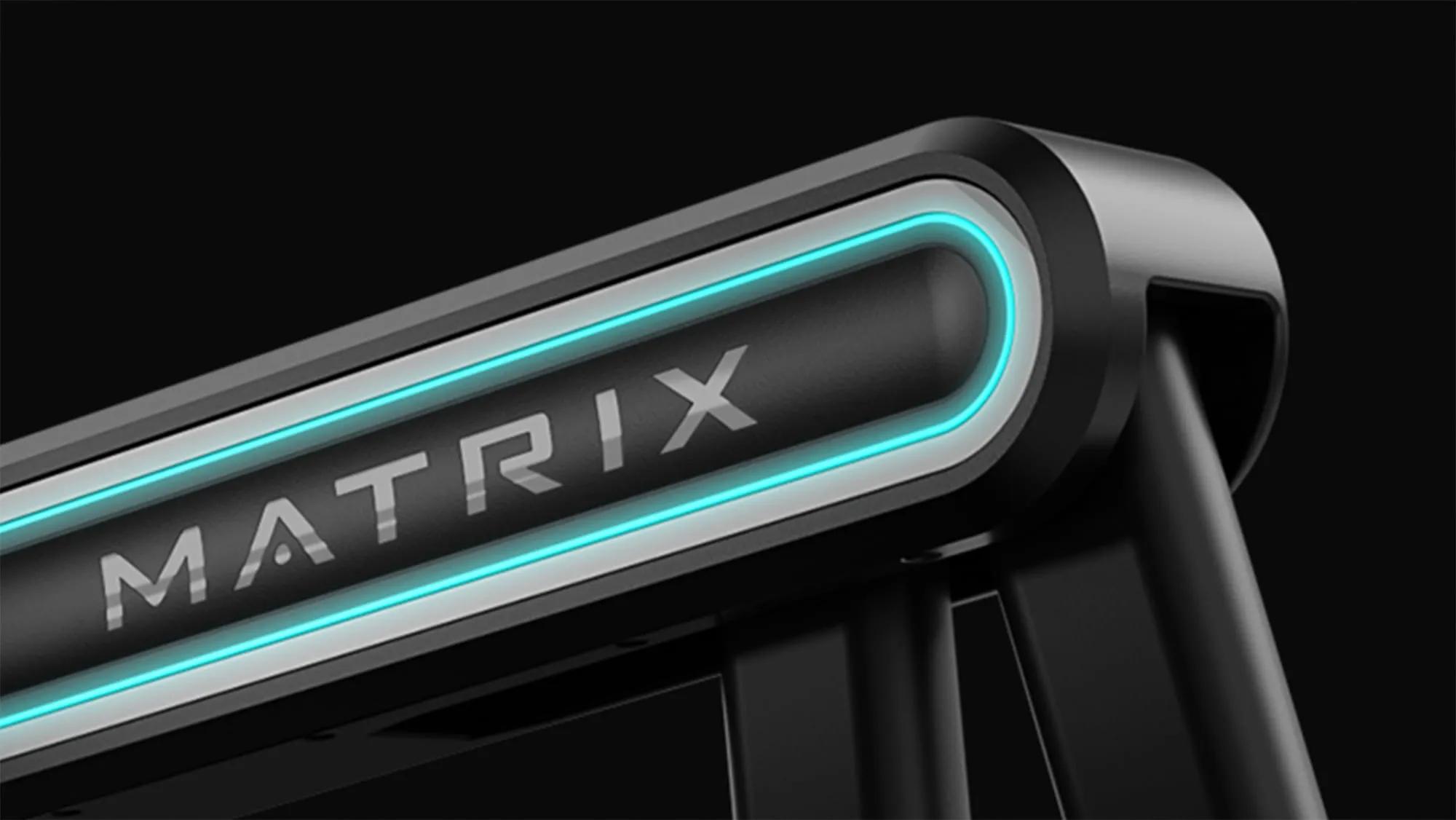 Close-up of Onyx Ascent Trainer's handrails with ambient lighting.