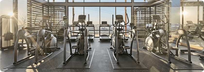 Vision Fitness cardio equipment in the FirstService Residential fitness center.