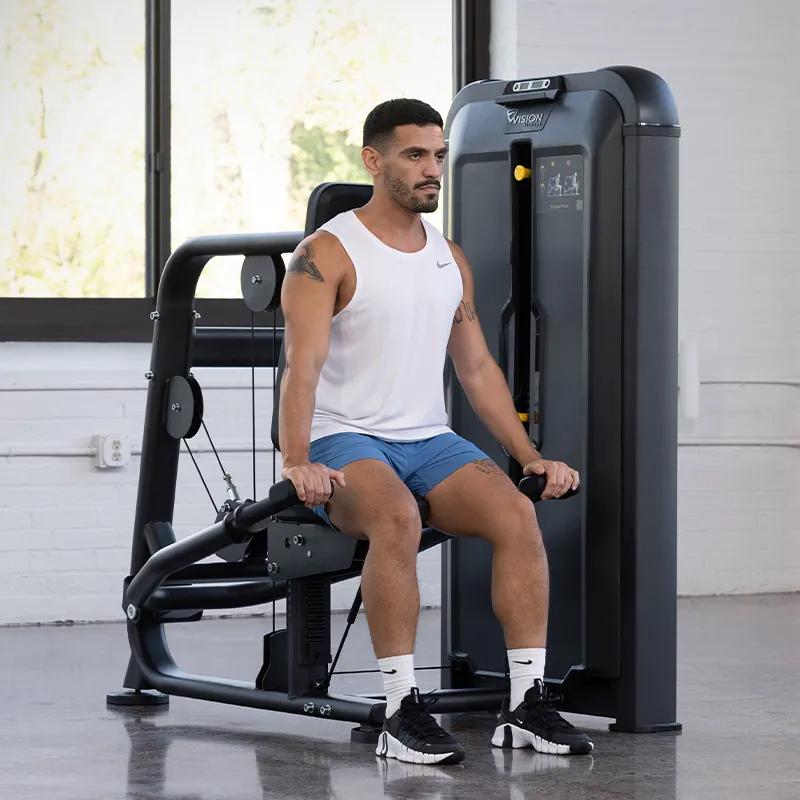 Front angle view of a man using the Keystone Triceps Press in a gym.